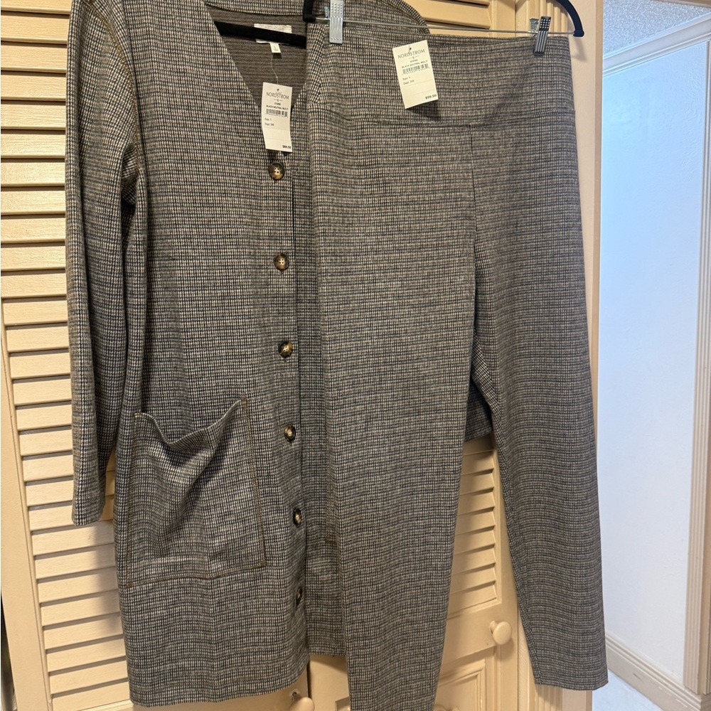 2 piece pantsuit. The top can be worn as a dress alone.